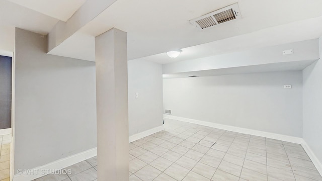 finished basement featuring baseboards