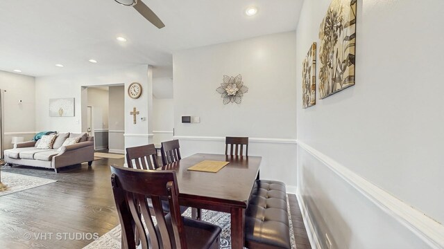 dining room featuring wood finished floors, a ceiling fan, recessed lighting, and baseboards