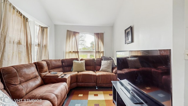 living room with lofted ceiling