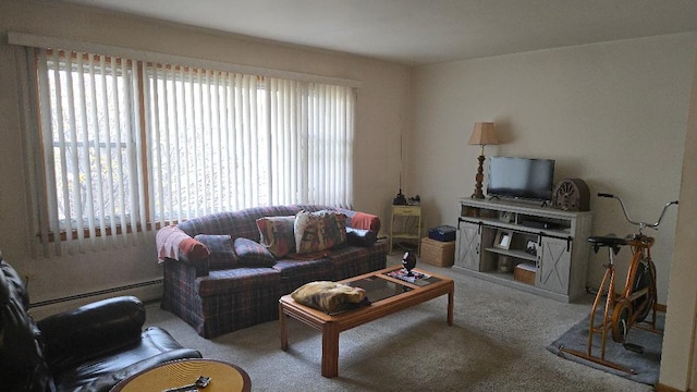 carpeted living room with a baseboard radiator
