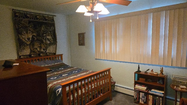 bedroom featuring a ceiling fan and a baseboard radiator