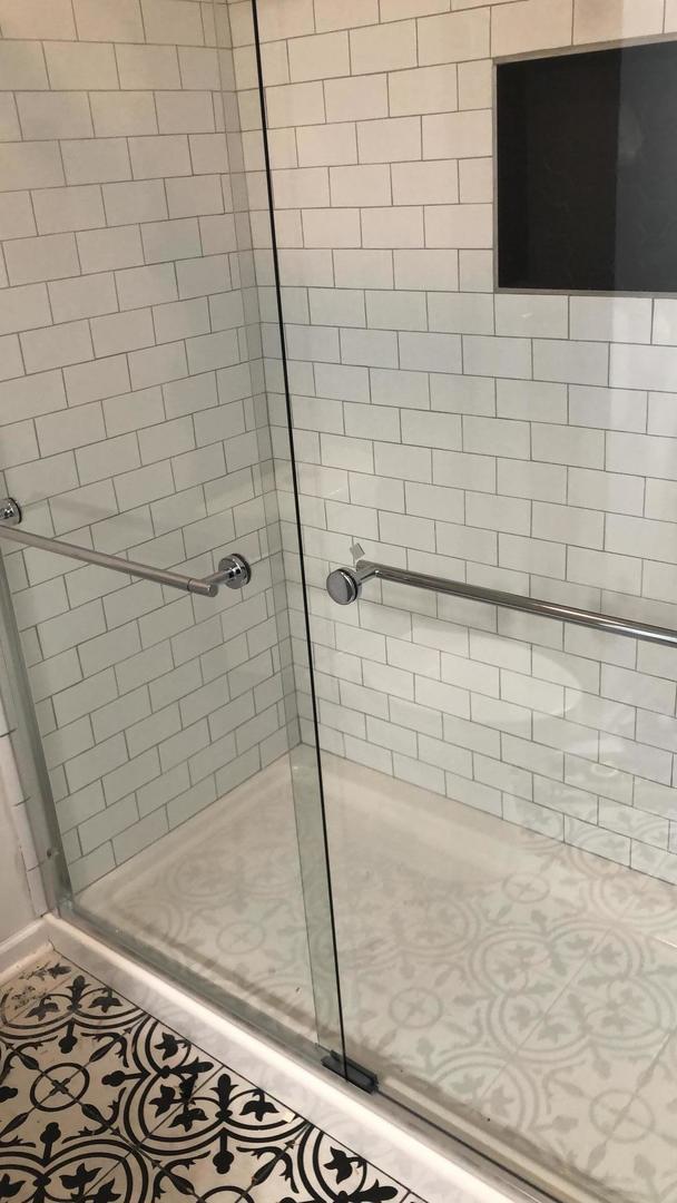 bathroom with a stall shower