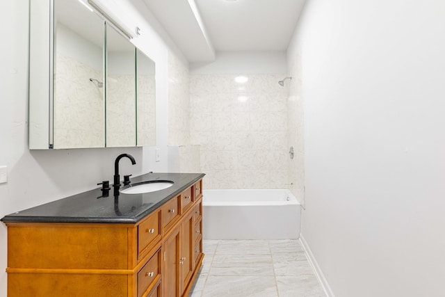 full bathroom featuring baseboards, marble finish floor, vanity, and shower / washtub combination