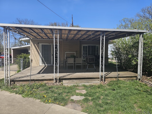 back of house featuring fence