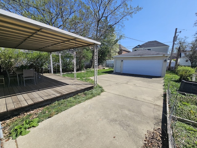 view of yard featuring fence, an outbuilding, and a wooden deck