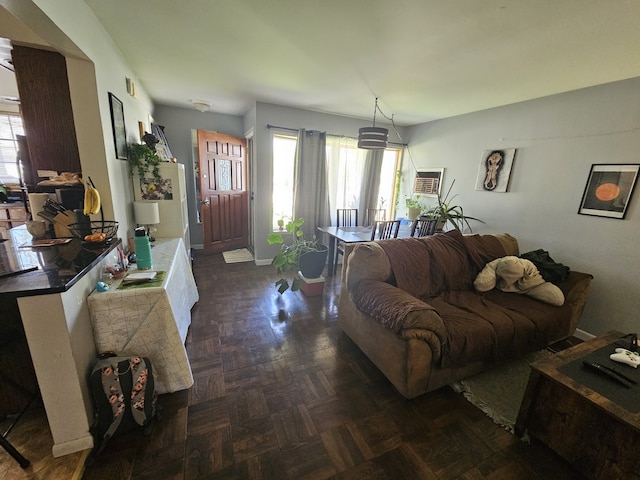 living area with a wall mounted AC