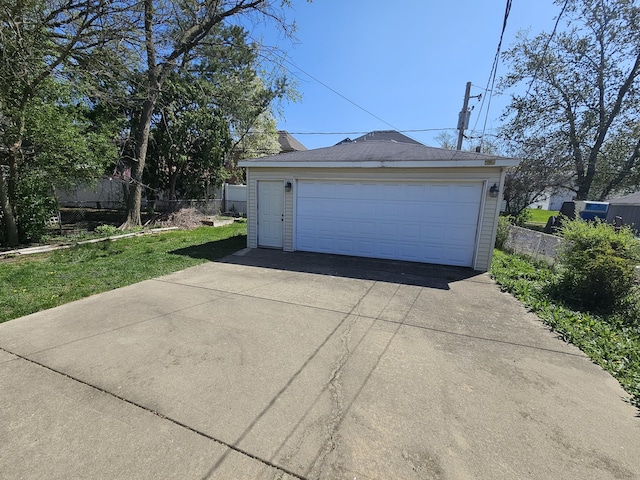 detached garage with fence