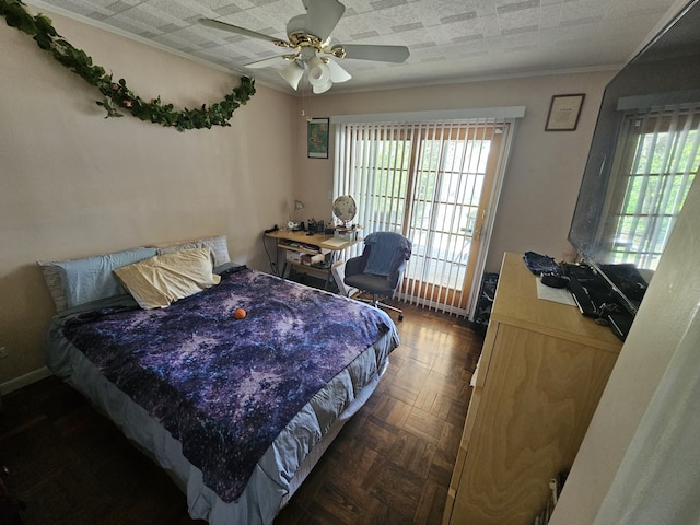 bedroom with ornamental molding, a ceiling fan, and multiple windows