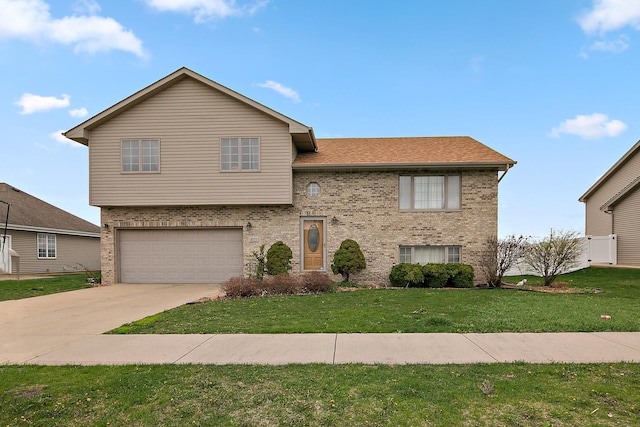 833 Poe St, Manteno, IL 60950 - view of front facade with concrete driveway, a shingled roof, a front yard, a garage, and brick siding