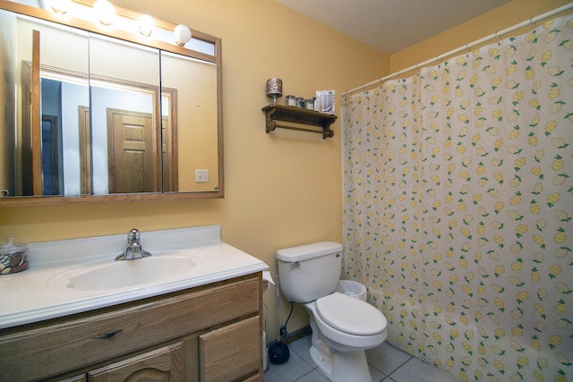 833 Poe St, Manteno, IL 60950 - full bath with a shower with curtain, tile patterned floors, vanity, and toilet