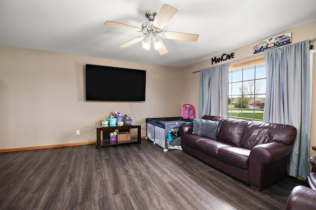 833 Poe St, Manteno, IL 60950 - living area featuring dark wood finished floors, baseboards, and ceiling fan