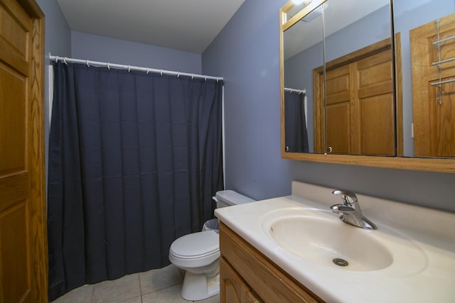 833 Poe St, Manteno, IL 60950 - bathroom featuring tile patterned floors, vanity, curtained shower, and toilet