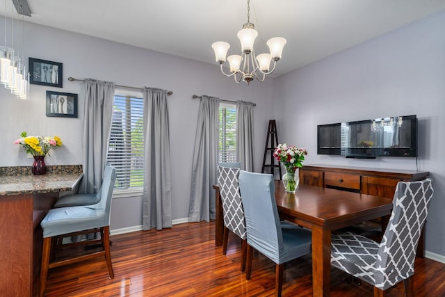 2743 River Bend Ln, Plainfield, IL 60586 - dining space featuring a chandelier, wood finished floors, and baseboards