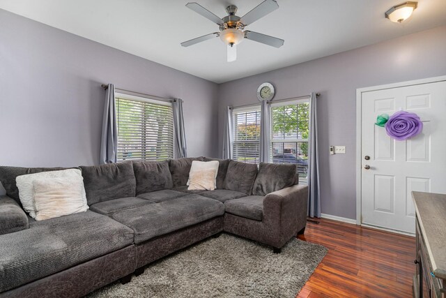 2743 River Bend Ln, Plainfield, IL 60586 - living area with dark wood-style flooring, plenty of natural light, ceiling fan, and baseboards