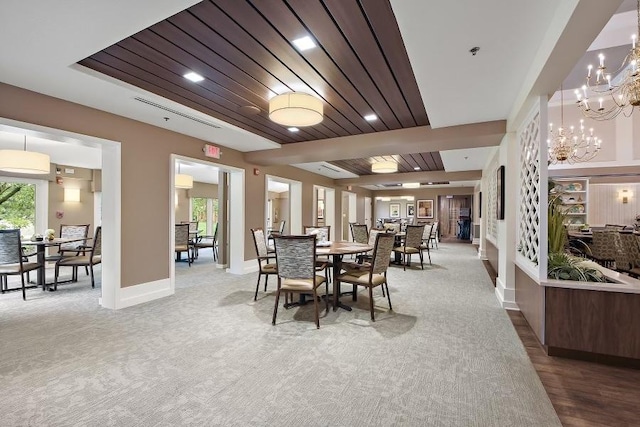 10300 Village Circle Dr Unit 1109, Palos Park, IL 60464 - carpeted dining space with a wealth of natural light, baseboards, and an inviting chandelier