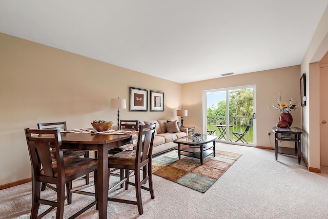 10300 Village Circle Dr Unit 1109, Palos Park, IL 60464 - dining room with visible vents, baseboards, and light carpet