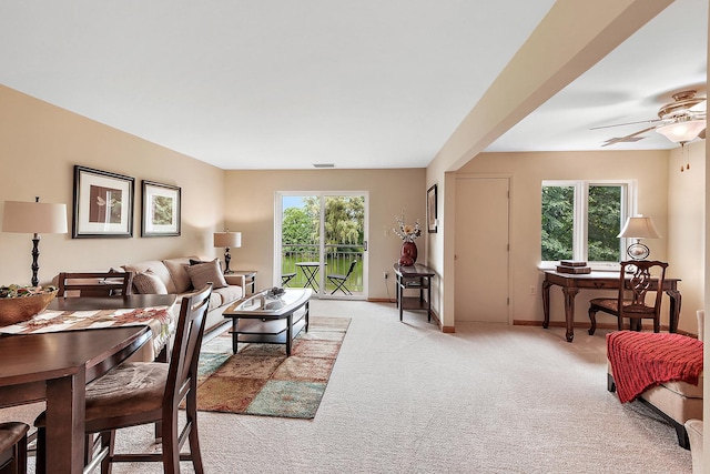 10300 Village Circle Dr Unit 1109, Palos Park, IL 60464 - living area with light carpet, a ceiling fan, visible vents, and baseboards