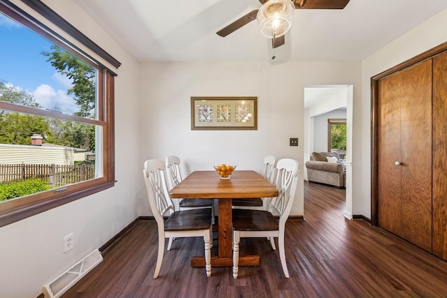 5873 Walnut Ave, Downers Grove, IL 60516 - dining space featuring dark wood-style flooring, a ceiling fan, and baseboards