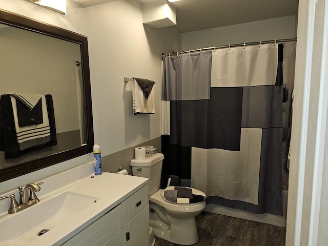 519 Greenwood Dr, Round Lake Park, IL 60073 - full bathroom featuring toilet, vanity, wood finished floors, and shower / bathtub combination with curtain