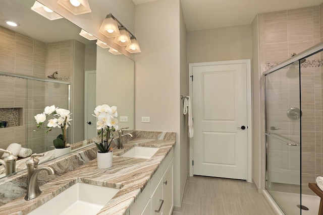 2701 Commons Dr Unit 409, Glenview, IL 60026 - full bath featuring a stall shower and double vanity
