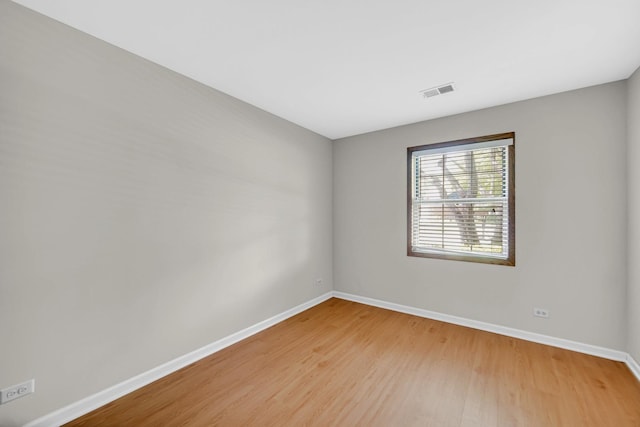 329 Pembroke Ct Unit 5, Schaumburg, IL 60193 - unfurnished room with baseboards and wood finished floors
