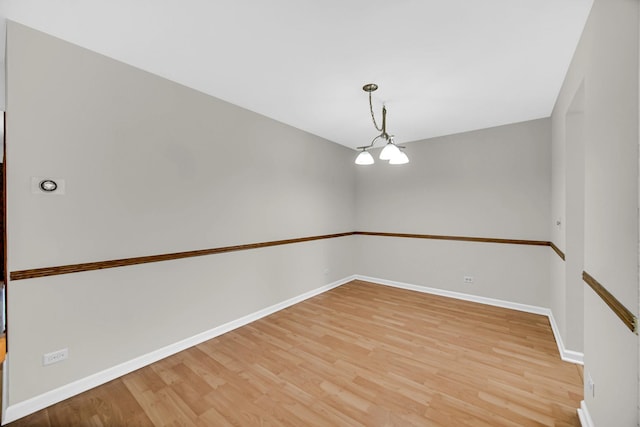 329 Pembroke Ct Unit 5, Schaumburg, IL 60193 - unfurnished room with light wood-style floors and baseboards