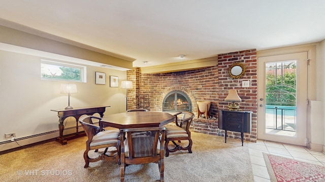 270 Concord Dr, Melrose Park, IL 60160 - dining space featuring a brick fireplace, healthy amount of natural light, a baseboard radiator, and light tile patterned floors