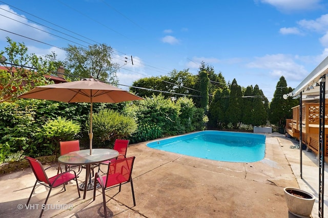 270 Concord Dr, Melrose Park, IL 60160 - outdoor pool with a patio and outdoor dining space