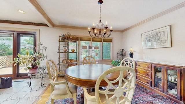 270 Concord Dr, Melrose Park, IL 60160 - dining room featuring plenty of natural light, a chandelier, and ornamental molding