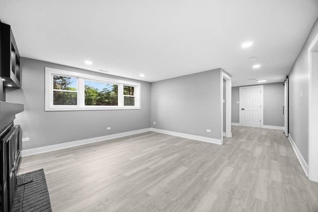 16560 Woodlawn W Ave, South Holland, IL 60473 - unfurnished living room featuring light wood-style flooring, a brick fireplace, baseboards, and recessed lighting