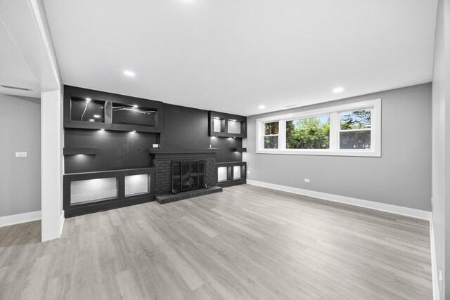 16560 Woodlawn W Ave, South Holland, IL 60473 - unfurnished living room with baseboards, a brick fireplace, wood finished floors, and recessed lighting