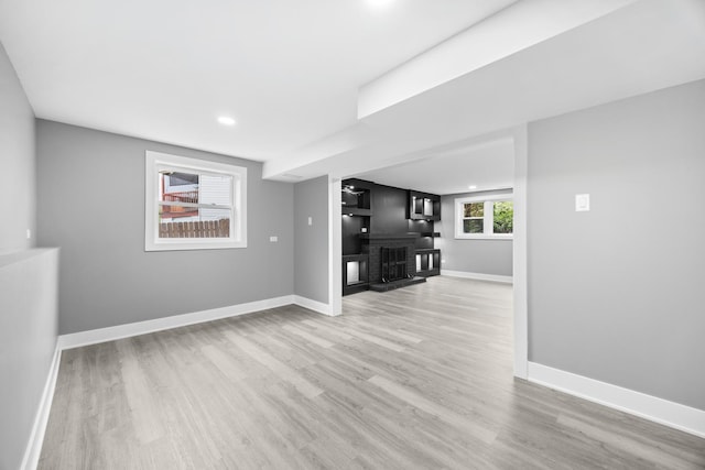 16560 Woodlawn W Ave, South Holland, IL 60473 - unfurnished living room with wood finished floors, baseboards, recessed lighting, and a brick fireplace