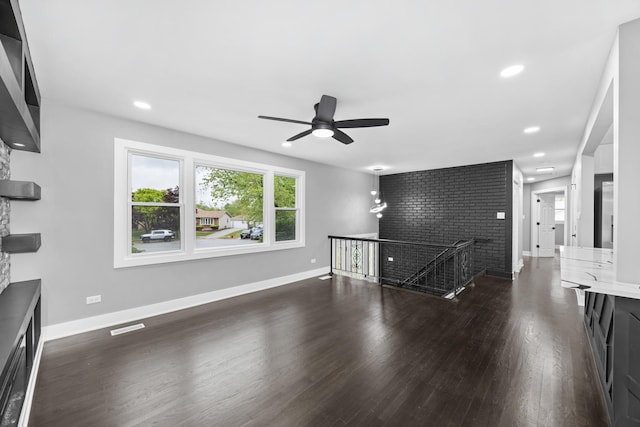 16560 Woodlawn W Ave, South Holland, IL 60473 - unfurnished living room with dark wood-style flooring, ceiling fan, baseboards, and recessed lighting