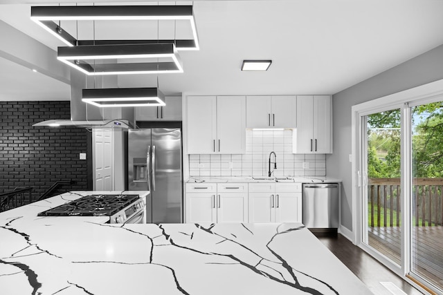 16560 Woodlawn W Ave, South Holland, IL 60473 - kitchen with stainless steel appliances, a sink, backsplash, and white cabinetry