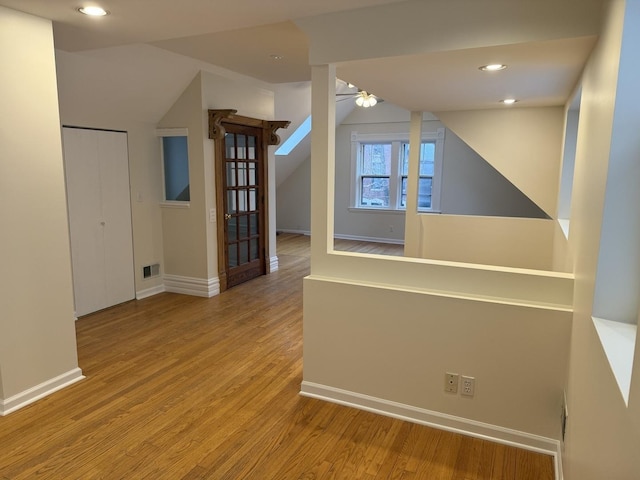 2446 W Thomas St, Chicago, IL 60622 - bonus room featuring visible vents, baseboards, a ceiling fan, and wood finished floors