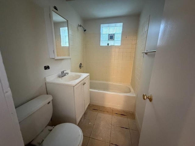 2446 W Thomas St, Chicago, IL 60622 - bathroom with tile patterned floors, toilet, vanity, and  shower combination