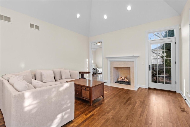572 Vine Ave, Highland Park, IL 60035 - living room with wood finished floors, visible vents, and high vaulted ceiling