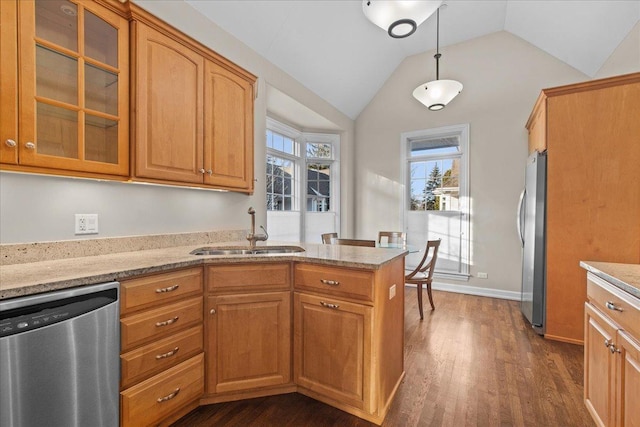 572 Vine Ave, Highland Park, IL 60035 - kitchen with stainless steel appliances, a sink, vaulted ceiling, glass insert cabinets, and dark wood-type flooring