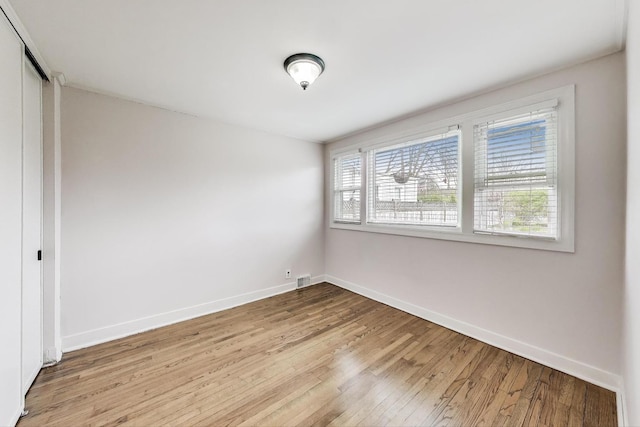 9633 Karlov Ave, Skokie, IL 60076 - spare room featuring hardwood / wood-style floors and baseboards