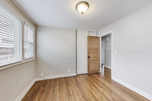 9633 Karlov Ave, Skokie, IL 60076 - unfurnished bedroom featuring light wood finished floors and baseboards