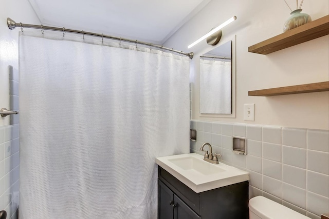 9633 Karlov Ave, Skokie, IL 60076 - bathroom featuring vanity, tile walls, and curtained shower