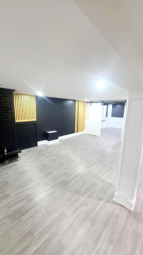 15562 Gouwens Ln, South Holland, IL 60473 - interior space featuring light wood-style flooring and baseboards