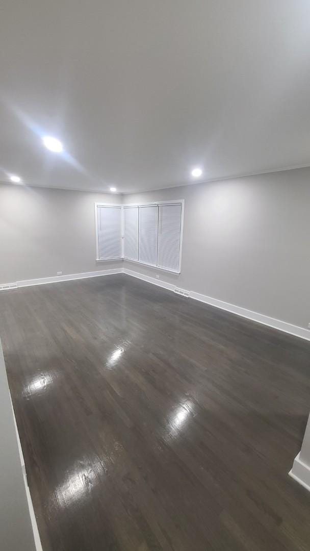 15562 Gouwens Ln, South Holland, IL 60473 - interior space with baseboards, recessed lighting, and dark wood-style flooring