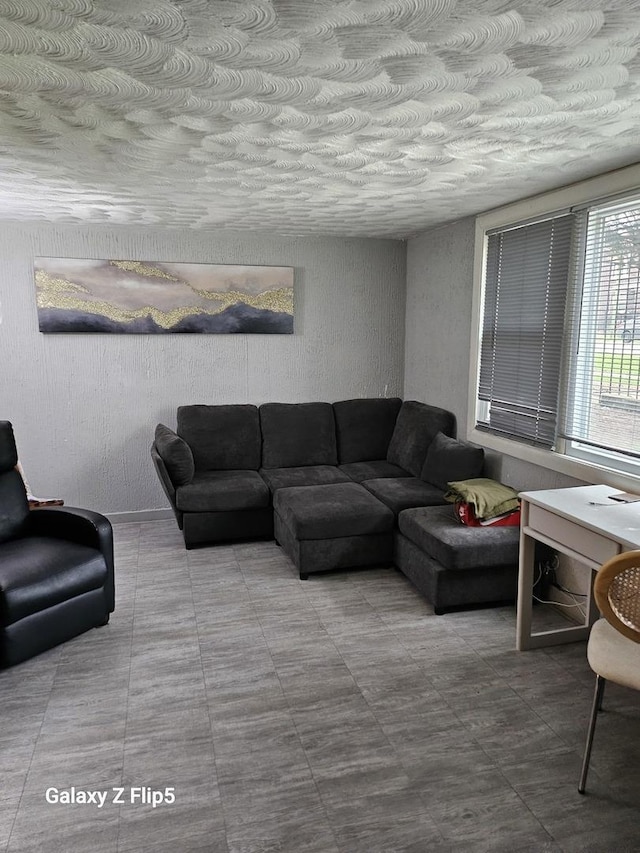 living room featuring a textured ceiling