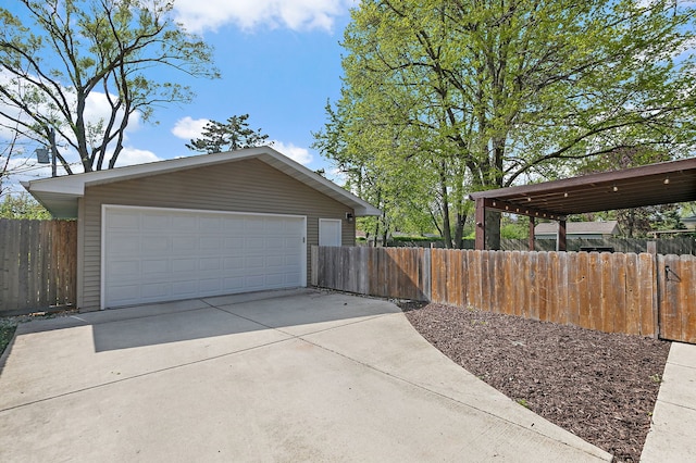detached garage with fence