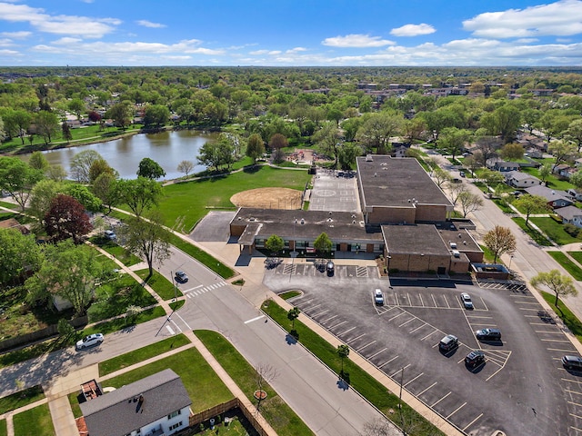 aerial view of property's location featuring a large body of water