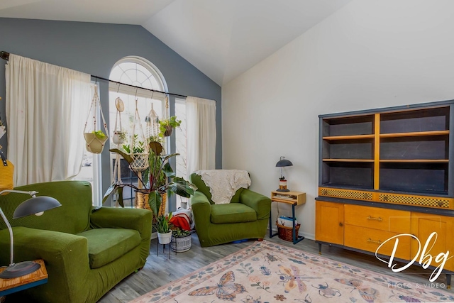 254 Spring Valley Way, Round Lake, IL 60073 - sitting room with baseboards, vaulted ceiling, and wood finished floors