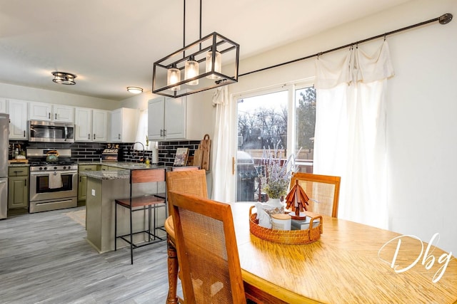 254 Spring Valley Way, Round Lake, IL 60073 - dining space with light wood-type flooring