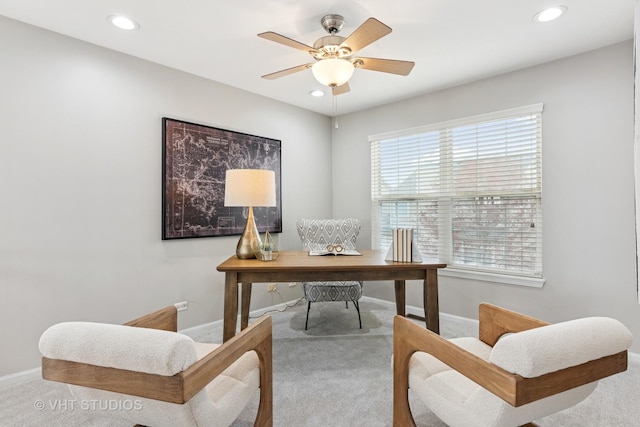 office area featuring baseboards and carpet flooring