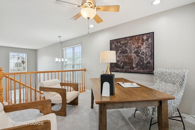 office area with recessed lighting, carpet, and ceiling fan with notable chandelier